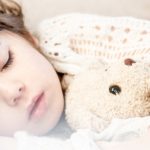 A little girl is sleeping